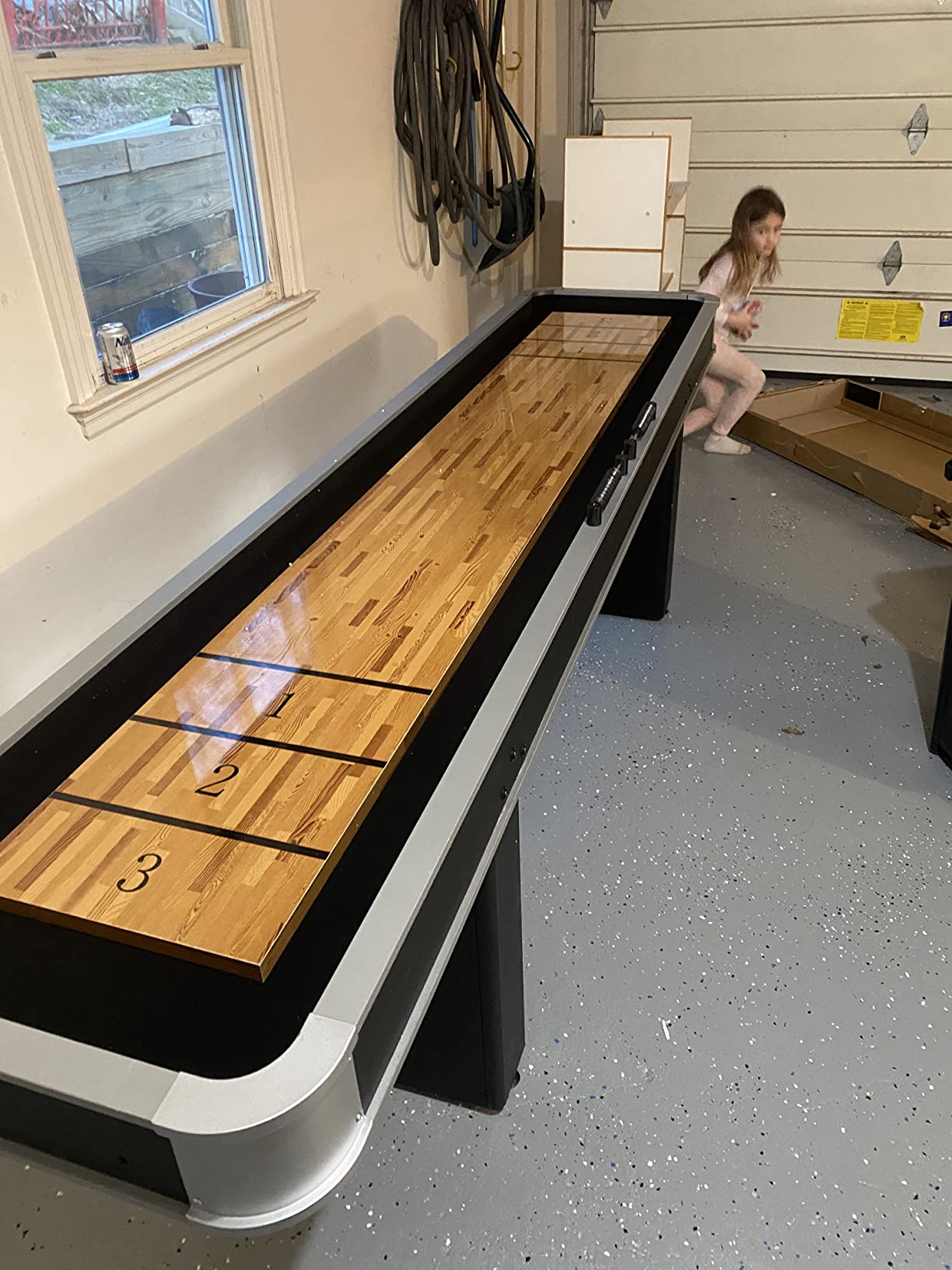 Atomic 9' LED Shuffleboard Tables with Poly-Coated Playing Surface for Smooth, Fast Puck Action and Pedestal Legs with Levelers for Optimum Stability and Level Play customer photo 2