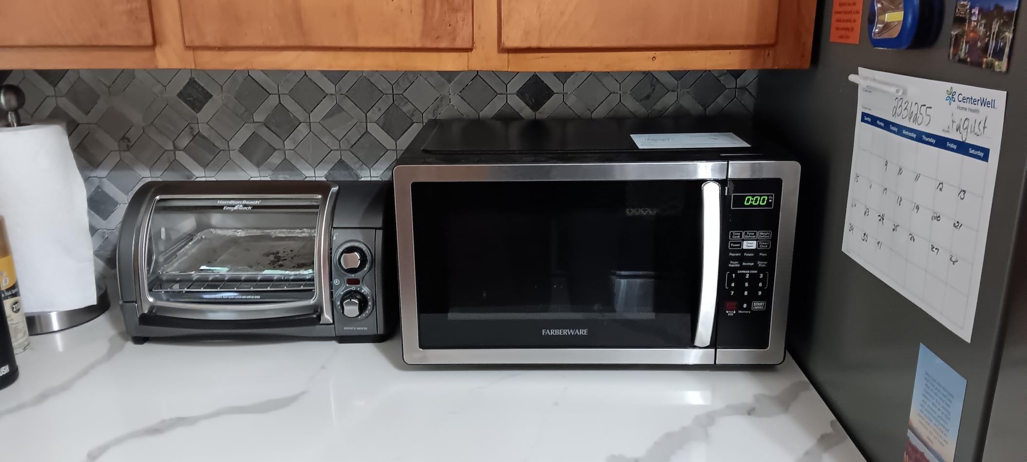 Farberware 1.1 Cu. Ft. Countertop Microwave Oven - 1000 Watts Power, Auto Cook Settings, Defrost, Easy Clean and Child Safety Lock - Stainless customer photo 2