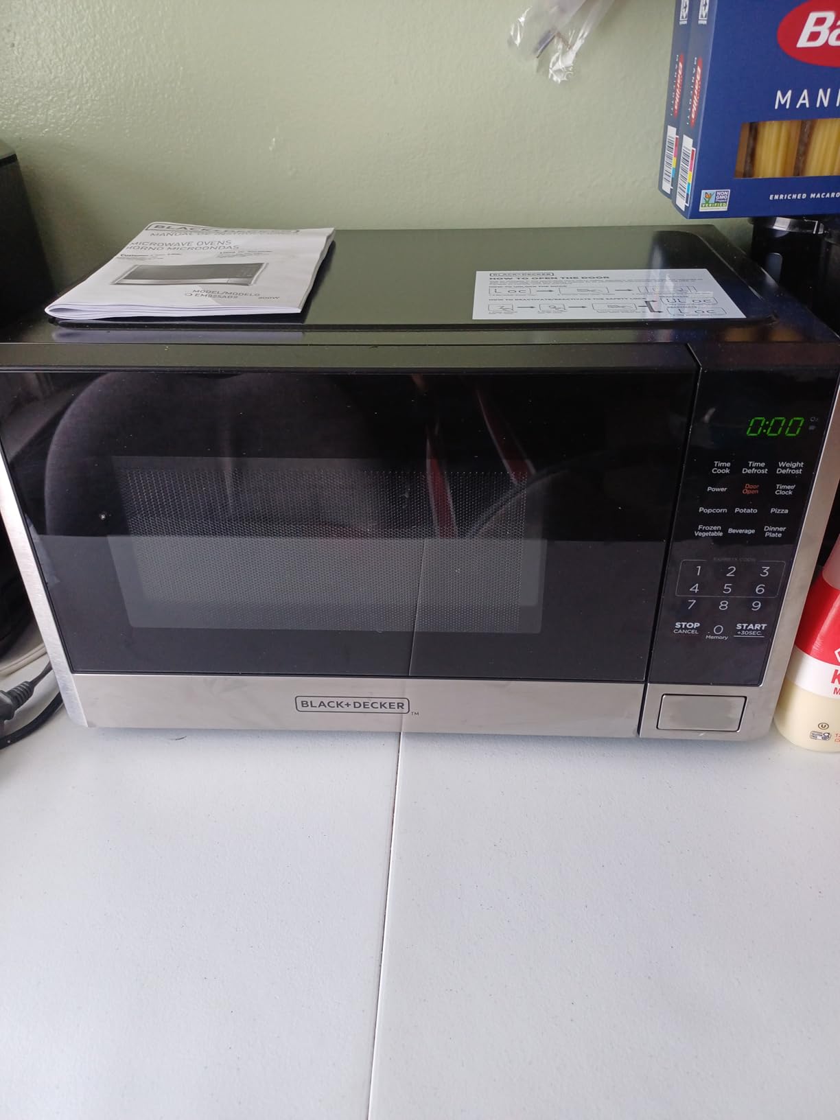 BLACK+DECKER Countertop Microwave Oven, 0.9 Cu.Ft, 900W, Stainless Steel | 10 Power Levels, Push-Button Door, Child Safety Lock, Countertop, 6 Auto Cook Presets customer photo 2