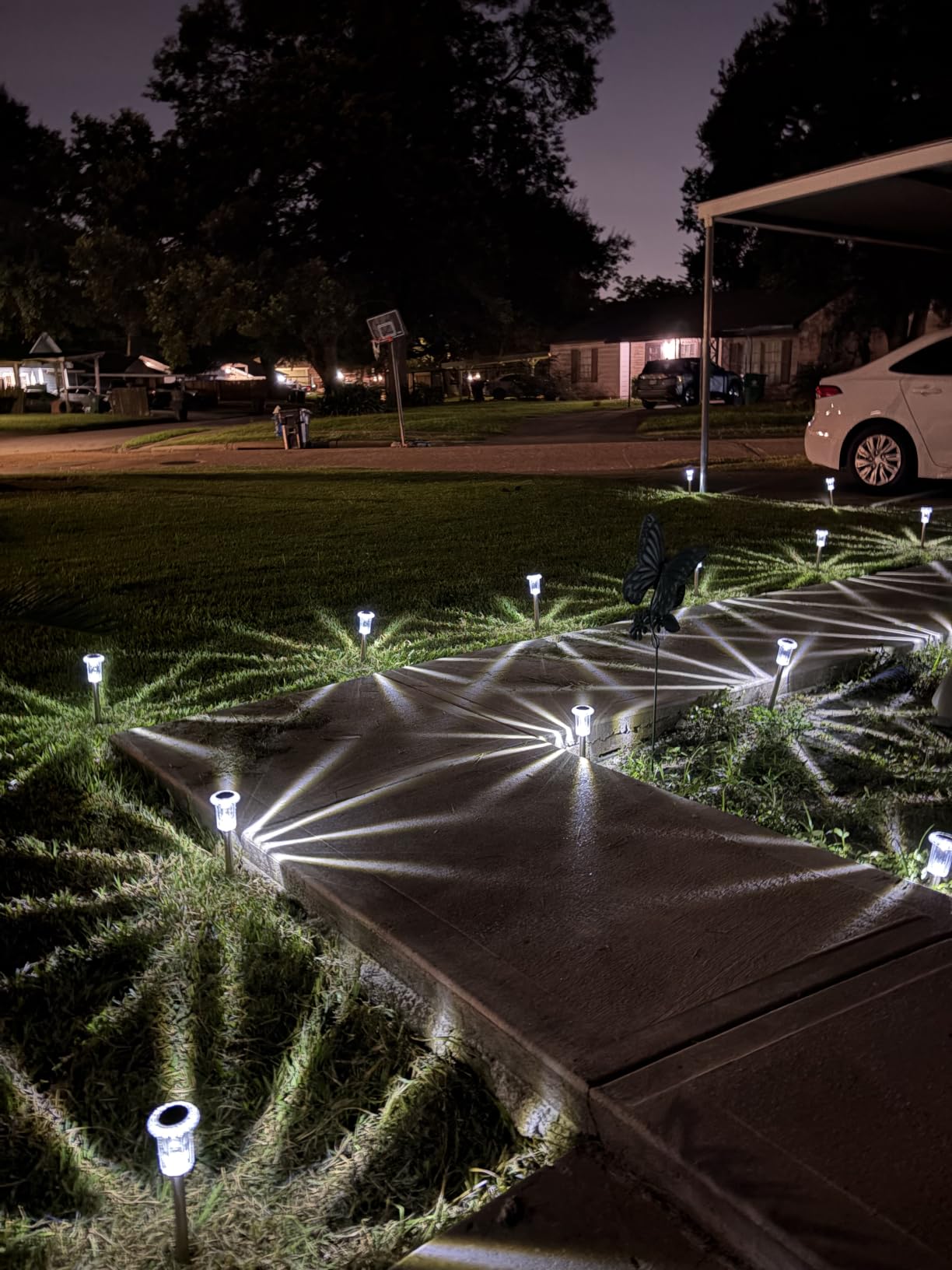 Eyrosa Solar Outdoor Lights, 10 Pack Waterproof Stainless Steel Solar Stake Lights for Pathway Garden Yard Path Walkway Driveway Lawn Patio Outside Decor, Cool White customer photo 1