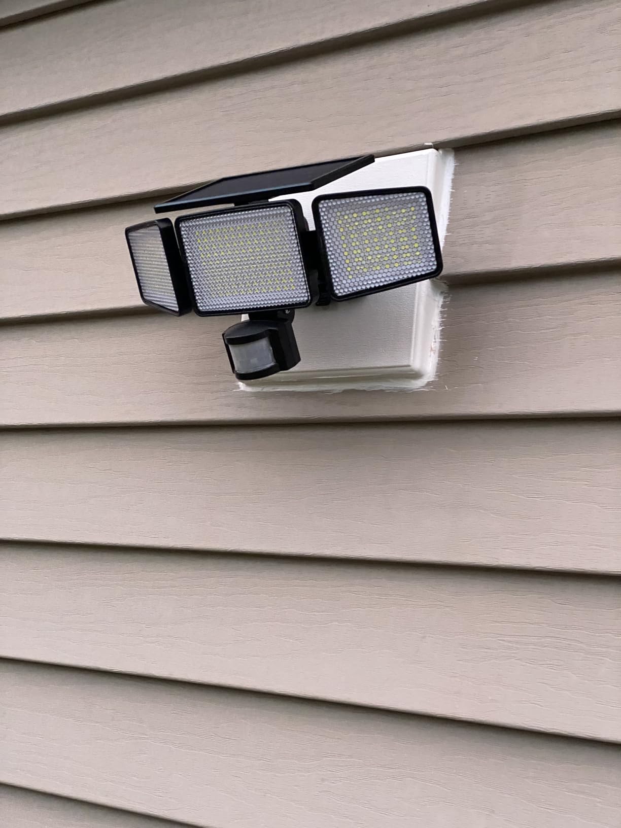 Philips Solar Security Light Outdoor 302 LED 1200lm, Solar-Powered Waterproof Wall-Mounted Flood Light w/PIR Motion Sensor, 3 Heads, IP65 Waterproof, 3 Modes (2 Packs) customer photo 1