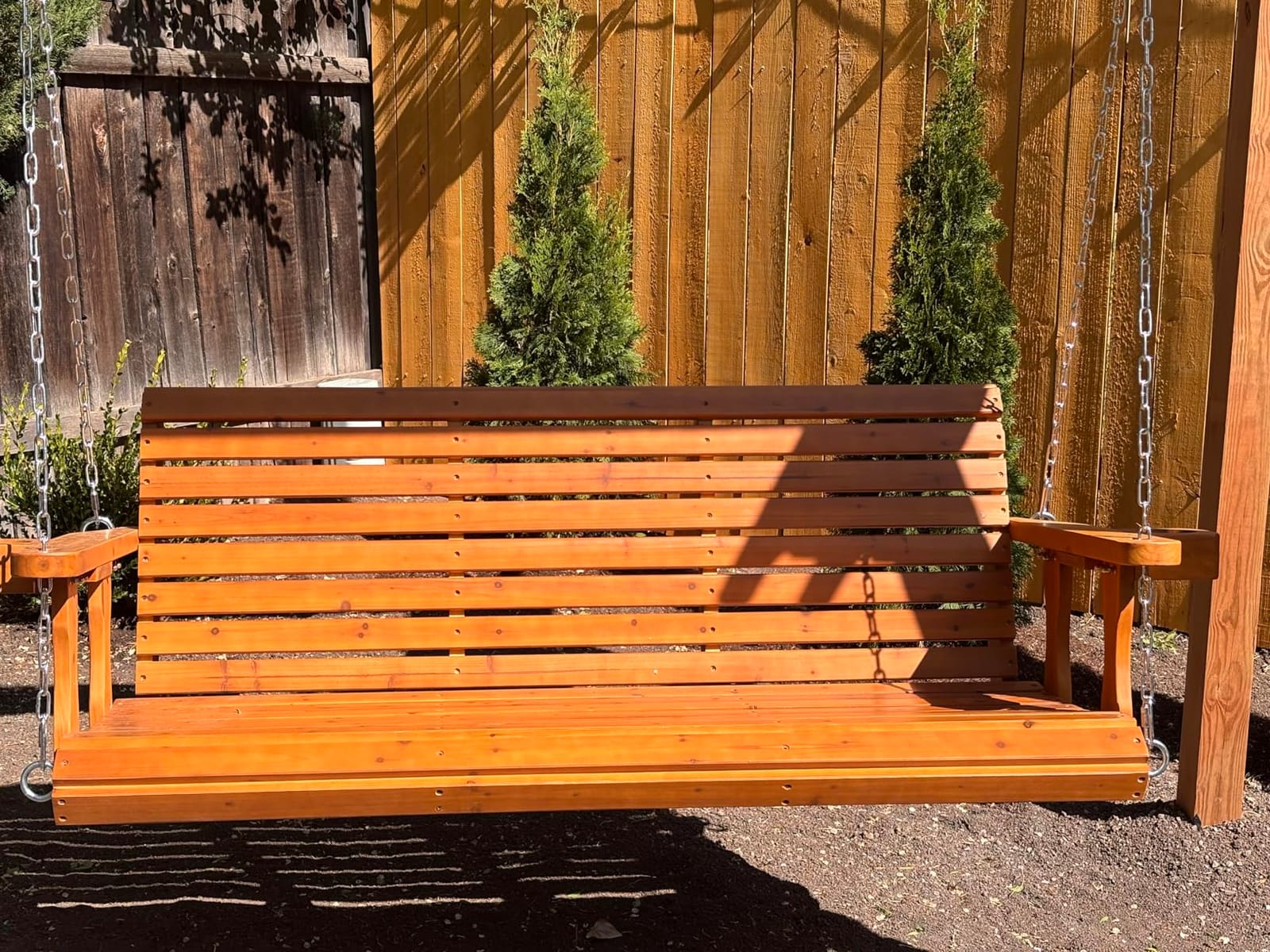 Wooden Porch Swing 2-Seater, High Backrest and Deep Seat, Bench Swing with Cupholders, Hanging Chains and 7mm Springs, Heavy Duty 880 LBS, for Outdoor Patio Garden (Cedar Tone - 4 FT Extra Large) customer photo 1