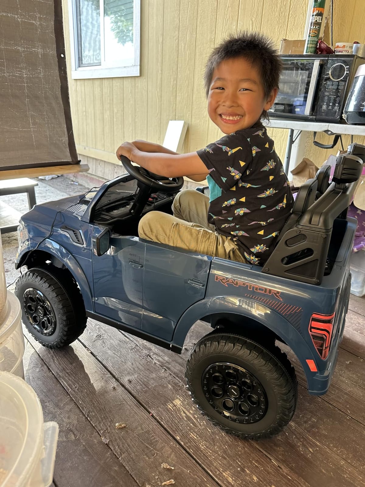 First Ride On 24V Kids Ride On Truck, Licensed Ford F-150 Raptor 2 Seater Electric Car w/Remote Control, Toddler Ride On Car Toys w/LED Lights, Bluetooth, Music, Truck Bed Storage, Soft Start (White) customer photo 1