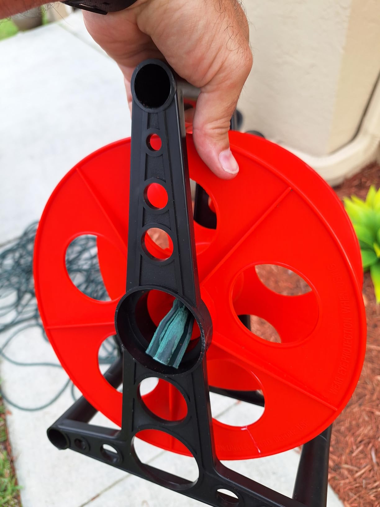 Woods Heavy Duty Cord Storage Wheel - Holds Up to 125 Feet of 16/3 or 110 Feet of 14/3 Gauge Cord - Tangle-Free Design for Extension Cords, Rope, or Hose - Orange/Black customer photo 1