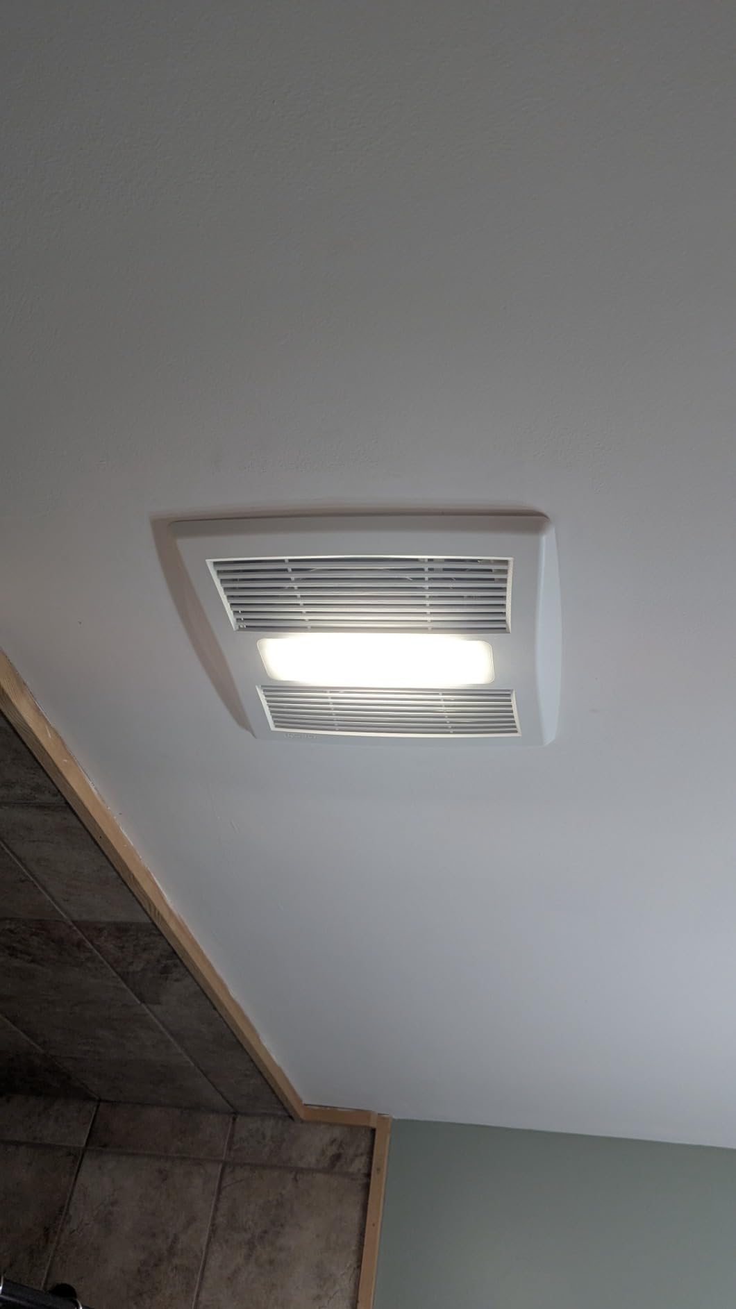 Broan-NuTone Bathroom Exhaust Fan with LED Light and Roomside Installation, Energy Star Certified, 110 CFM, Very Quiet 1.0 Sones White, AE110L customer photo 1