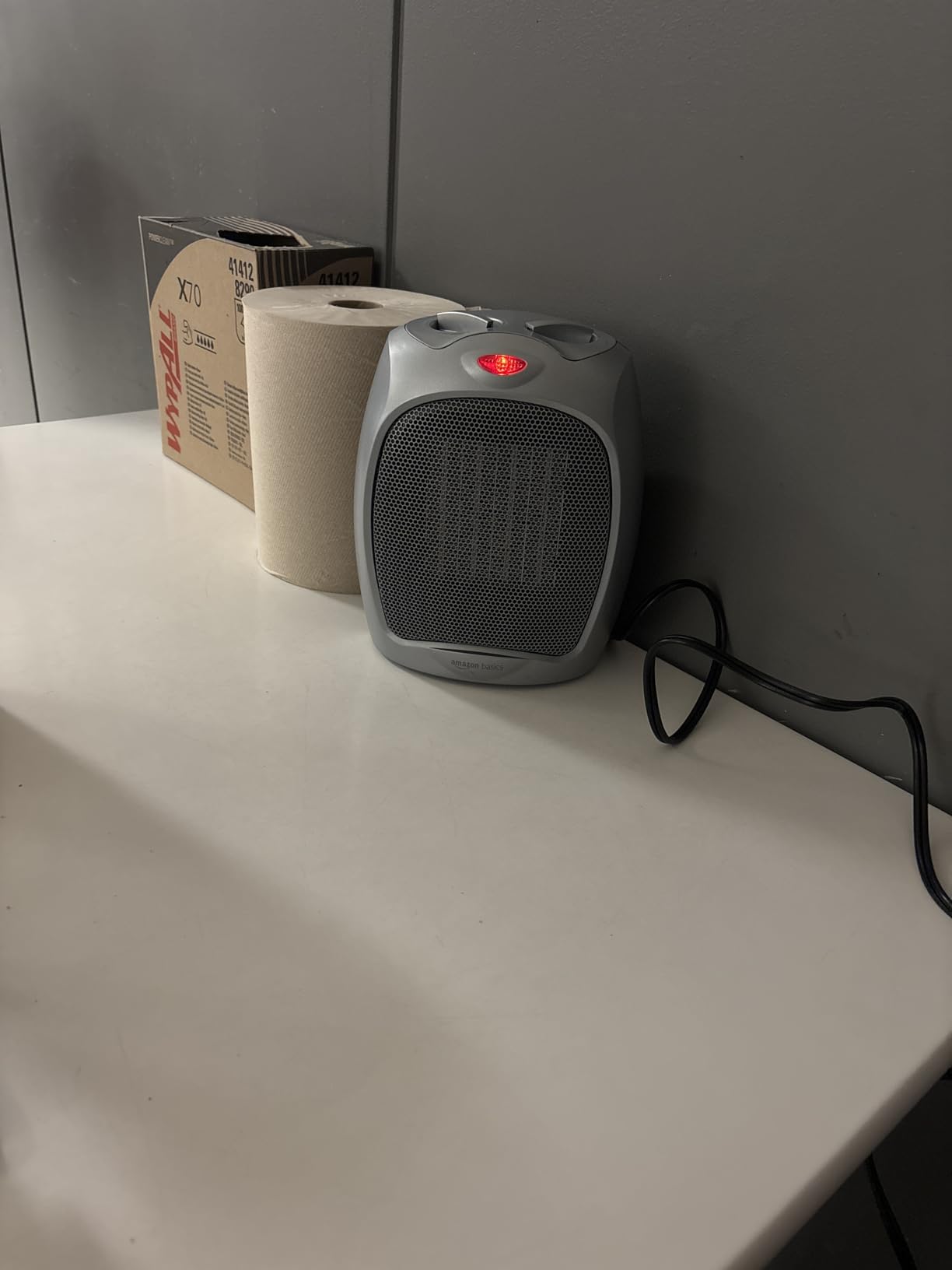 Amazon Basics Ceramic Space Heater, Portable Indoor Heating Solution, With Overheat and Tip-Over Protection, Thermostat, Non-Oscillating, 1500W, Fast Heating, 7.52