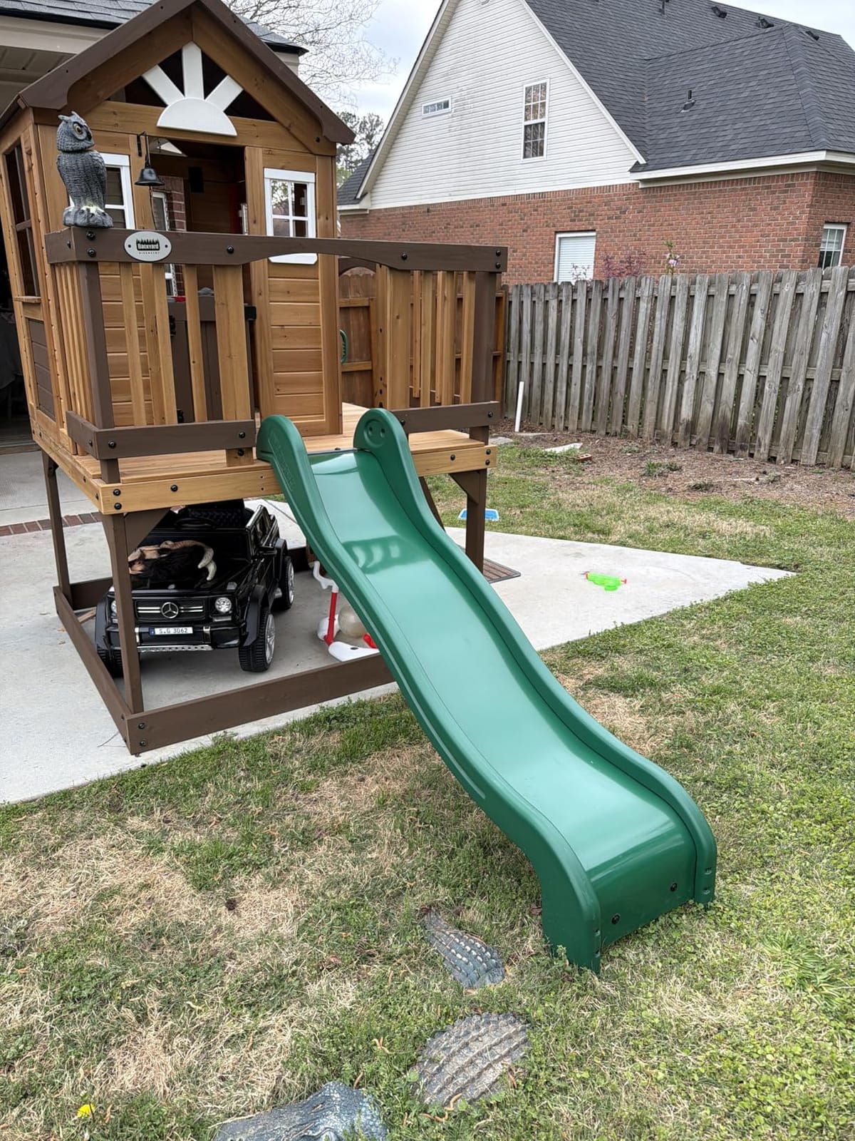 Backyard Discovery Echo Heights Elevated Cedar Wooden Kids Playhouse with Wave Slide, Play Kitchen, Wrap-Around Deck, Flat-Step Ladder, Half Door, Windows, Bell, and Growth Chart for Outdoor Play customer photo 2
