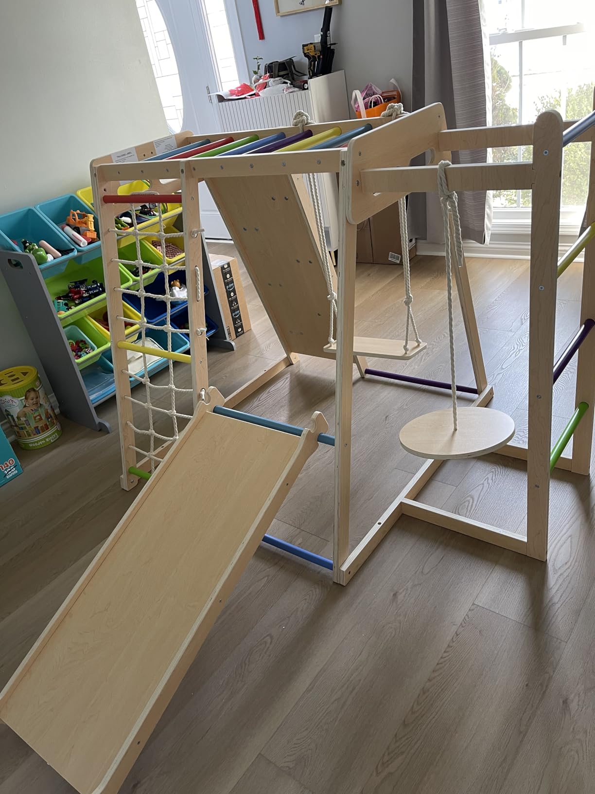 OLAKIDS Indoor Jungle Gym, 9 in 1 Wooden Montessori Baby Climbing Toys with Adjustable 2 Swings Ramp, Monkey Bar Basketball Hoop Ladder Climb Net (Natural) customer photo 2