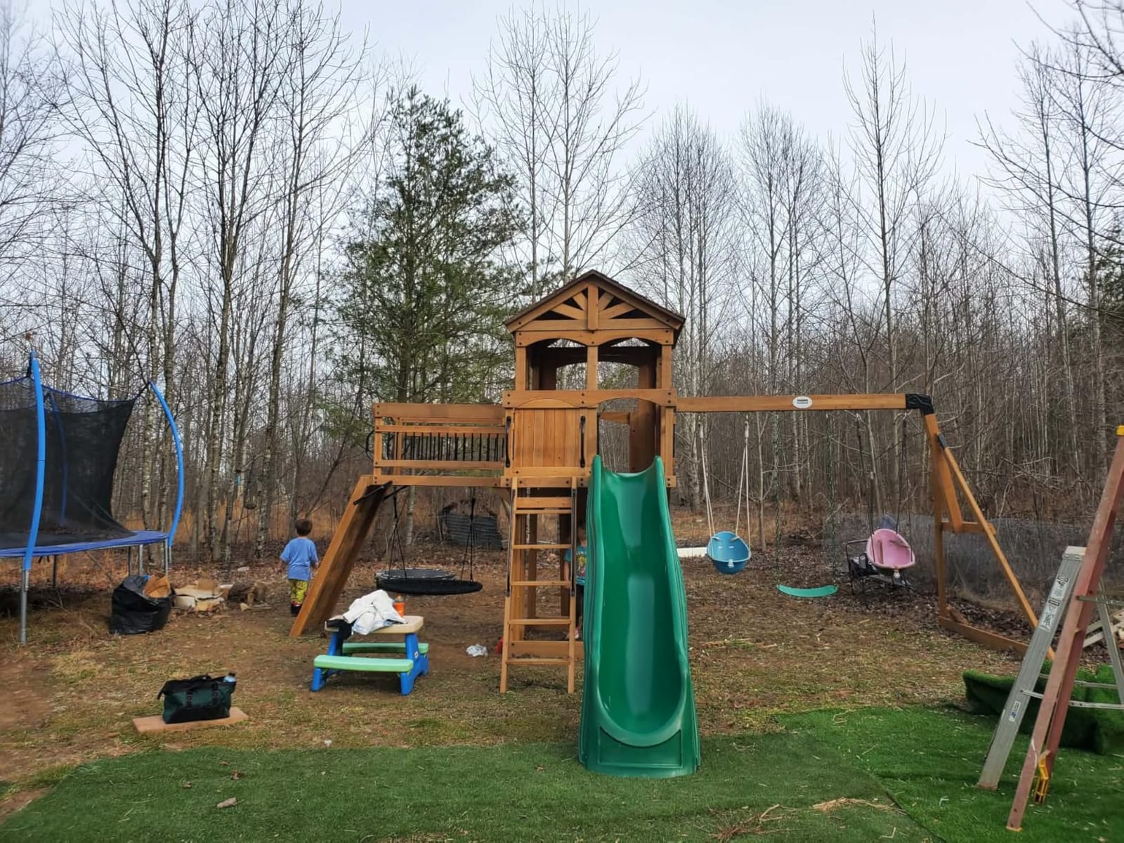 Backyard Discovery Dover Bay Spruce Wood Swing Set with Wave Slide, Clubhouse, Monkey Bars, Rock Wall, Belt Swings, Step Ladder, Toy Telescope, Chalkboard, Outdoor Playset customer photo 2